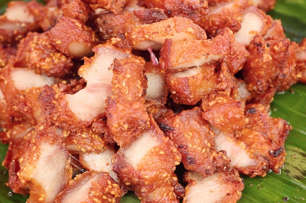 Premium Photo | Fried pork at street food