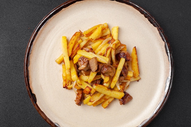 Premium Photo Fried Potatoes With Mushrooms And Vegetables