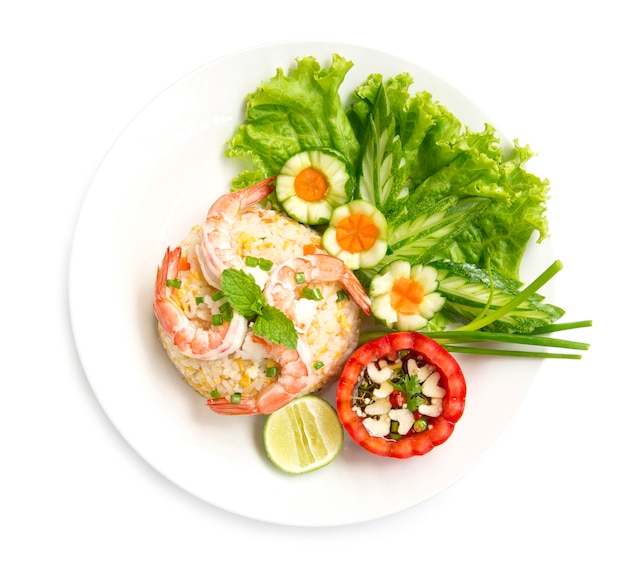 Premium Photo | Fried rice with shrimp decorate with vegetables carved