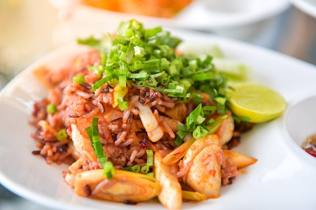 Premium Photo | Fried rice with squid, thai food.