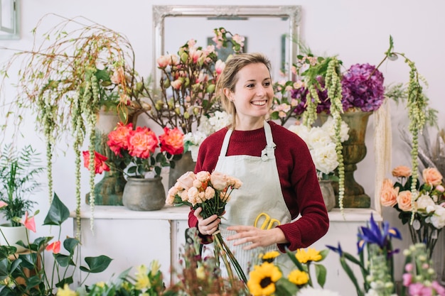 Free Photo | Friendly florist in flower shop