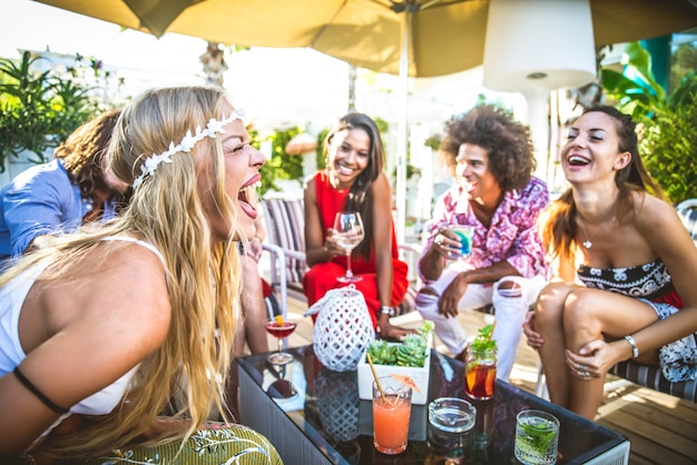 Premium Photo | Friends making party in a lounge bar