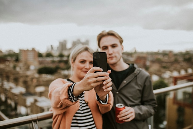 Premium Photo | Friends taking a group selfie