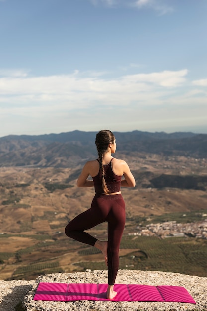 Free Photo | Front view back pose of yoga practice