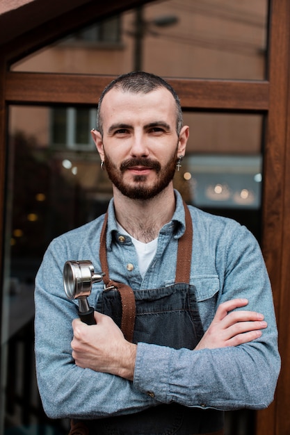 Front view business man with apron Free Photo