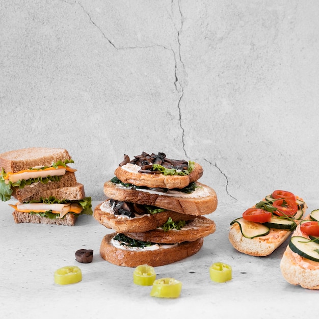 Free Photo | Front view composition of delicious sandwiches