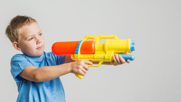 kid with water gun