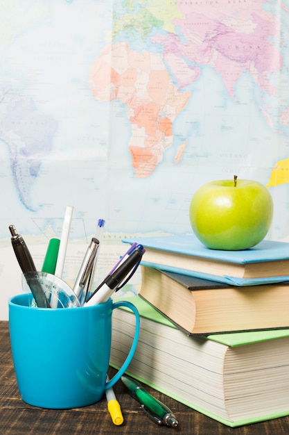 Front View Of Desk With School Supplies And An Apple Photo Free