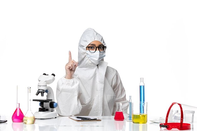 Free Photo | Front view female chemist in special protective suit ...