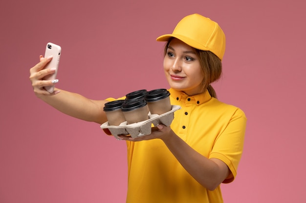 Download Free Photo | Front view female courier in yellow uniform ...