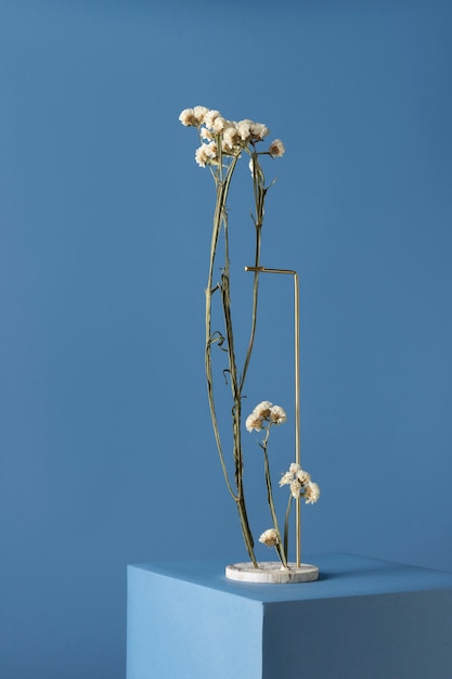 Free Photo | Front view of flower decor on a marble stand