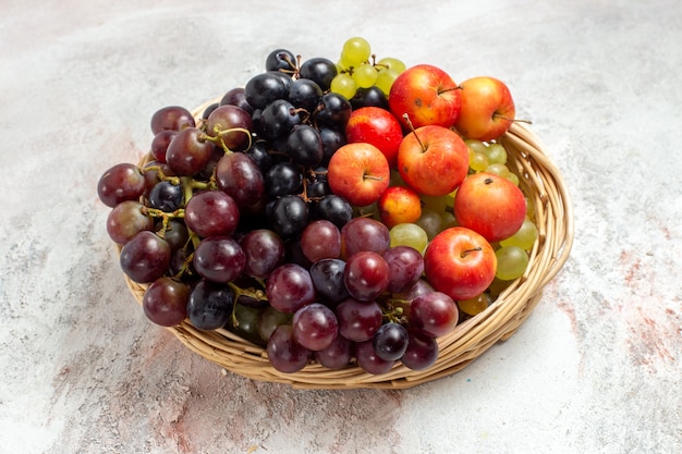 Free Photo | Front view fresh grapes inside basket on white space