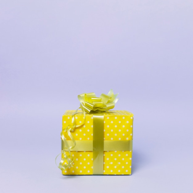  Front  view of gift box  with ribbon and copy space Free  Photo