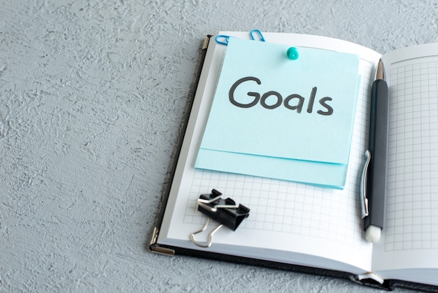 setting goals in notebook