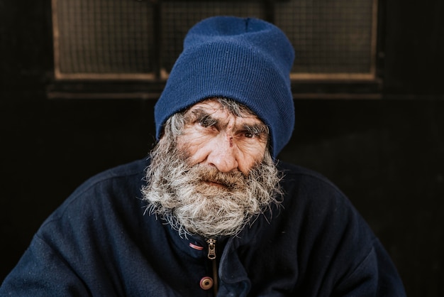 Free Photo | Front view of homeless man with beard