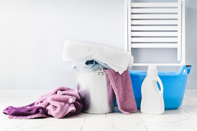 Front view laundry baskets with detergent Free Photo