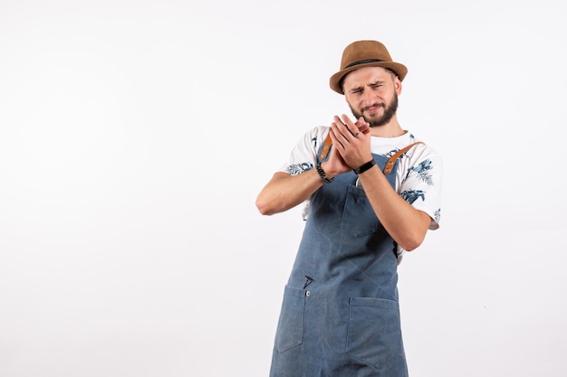 Free Photo | Front view male bartender posing and clapping on white ...