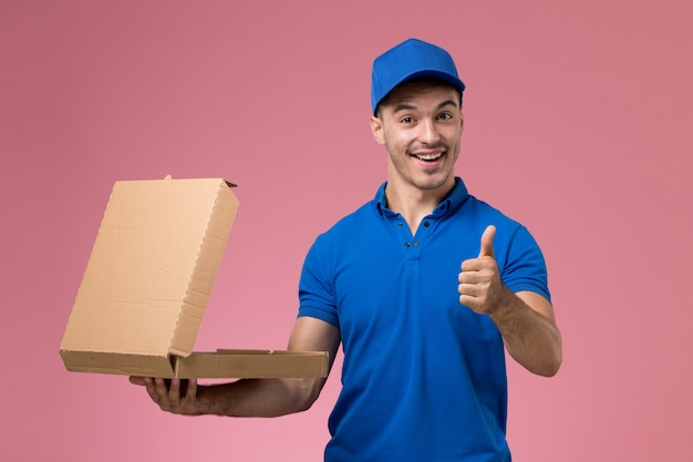 Download Free Photo | Front view male courier in blue uniform ...