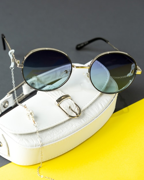 Download A front view modern dark sunglasses on the yellow-black ...