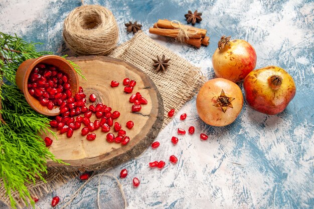 Free Photo | Front view pomegranates scattered pomegranate seeds in ...