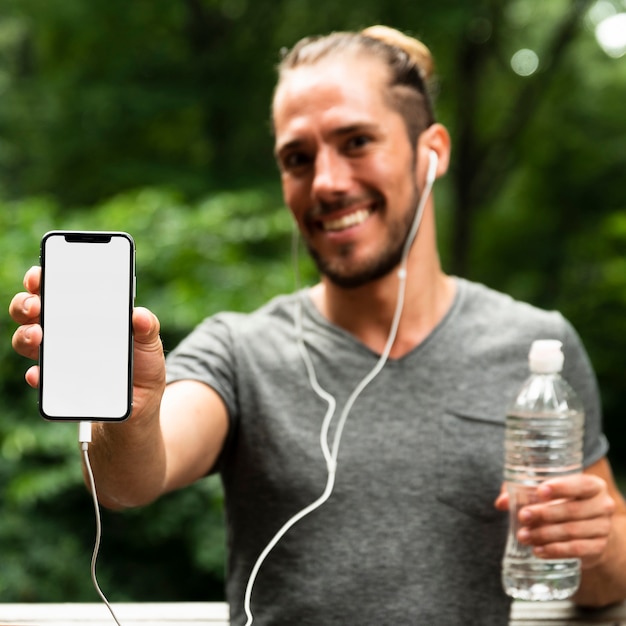 Front view of runner with phone mock-up Free Photo