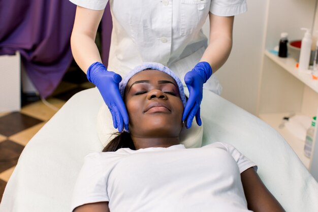 Premium Photo Front View Of Young African Woman Relaxing On Massage