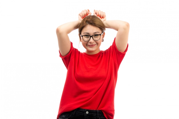 red t shirt and black jeans