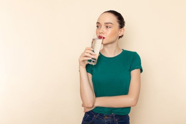 green shirt with blue jeans