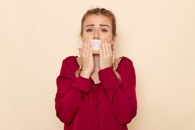 Free Photo Front view young female in red shirt with tied mouth ...