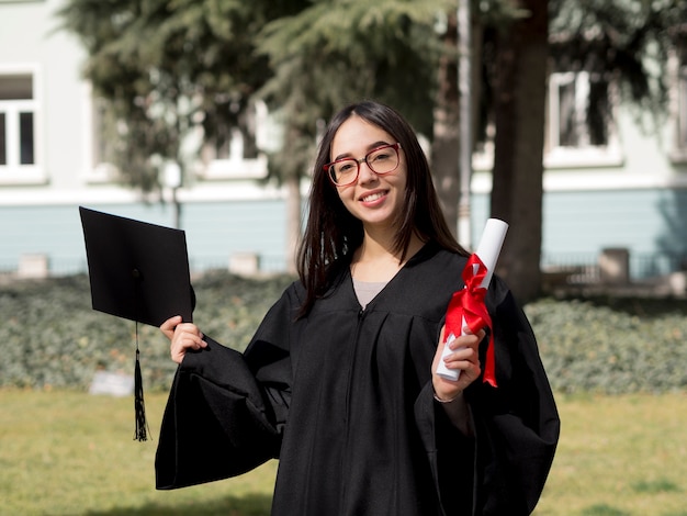 wearing graduation gown