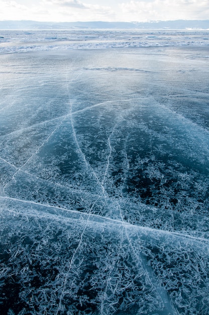 Premium Photo Frozen Lake Baikal Beautiful Stratus Clouds Over The Ice Surface On A Frosty Day