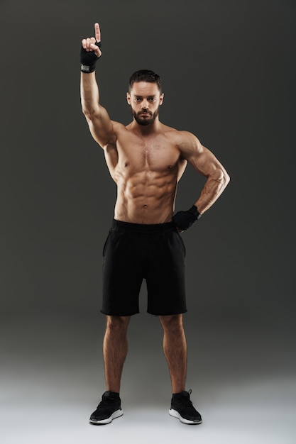 Premium Photo Full Length Portrait Of A Confident Muscular Man Posing 