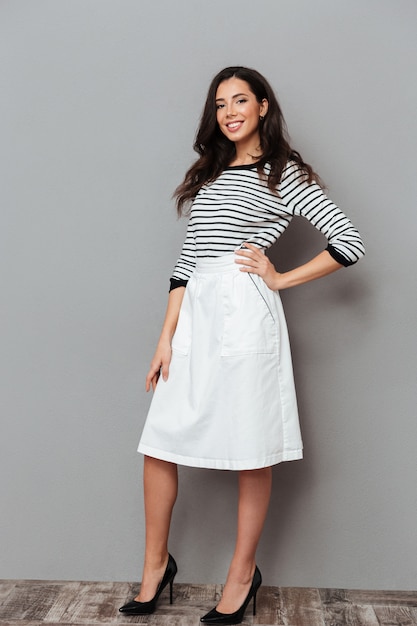 Full length portrait of a woman dressed in a skirt Free Photo