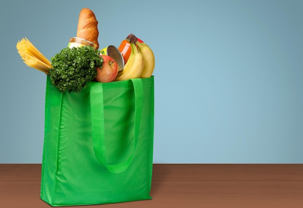 Premium Photo | Full shopping bag, isolated over background