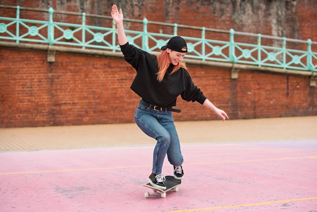 Premium Photo | Full shot woman on skateboard