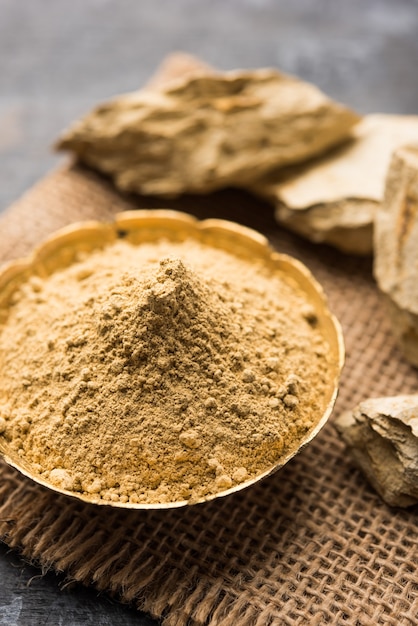 Premium Photo | Fuller's earth clay or multani mitti in a bowl along ...