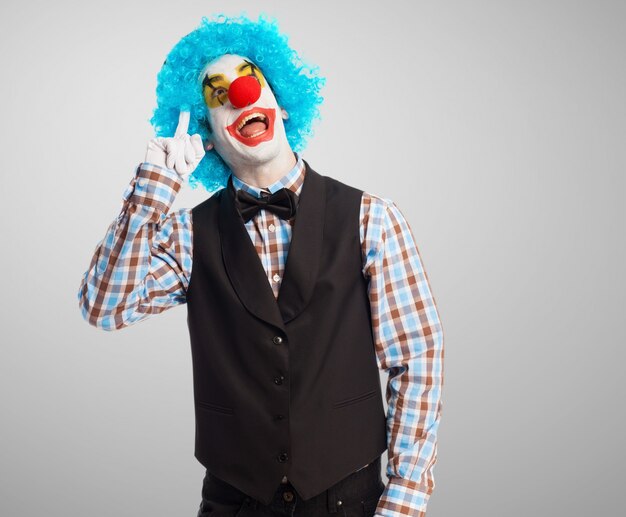 Free Photo | Funny clown thinking about his new trick