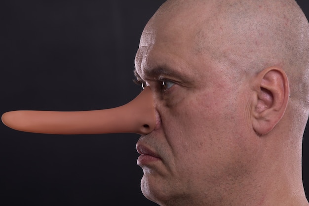 Premium Photo | Funny man with a long nose