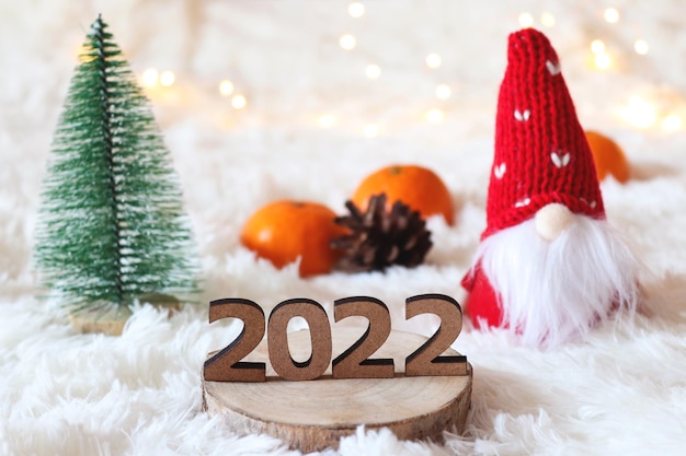 Christmas 2022 Toy Premium Photo | Funny New Year Or Christmas Greeting Card With Numbers 2022  Toy Gnome Christmas Tree Tangerines