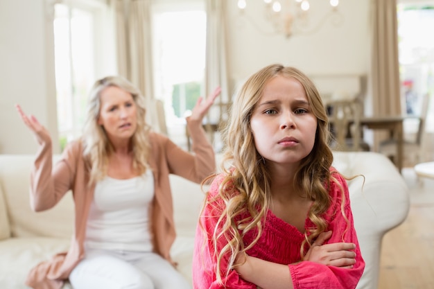Premium Photo Furious Mother Arguing With Her Daughter In Living Room 