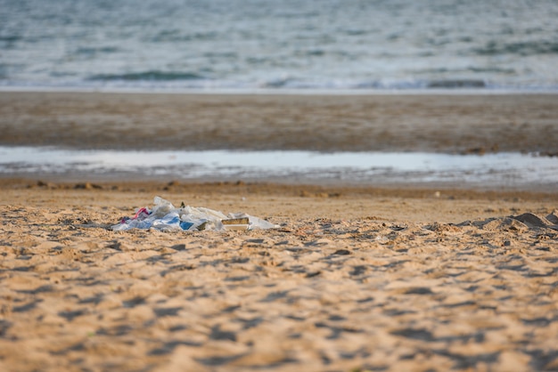 Premium Photo | Garbage in the sea with bag plastic bottle and other ...