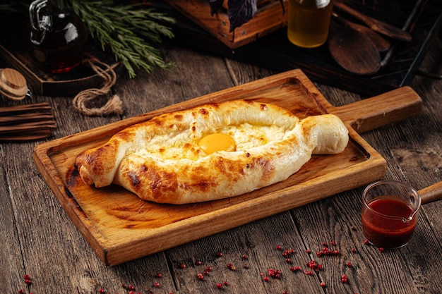 Premium Photo | Georgian Adjarian Khachapuri Bread With Cheese