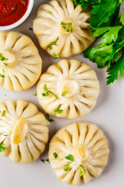 Premium Photo | Georgian traditional dumplings khinkali with meat and ...