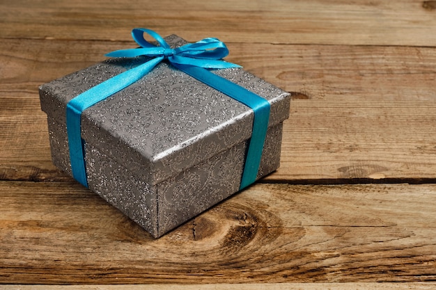 Gift box with blue ribbon Premium Photo
