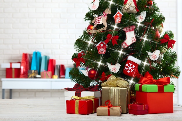 Premium Photo  Gift boxes and christmas tree