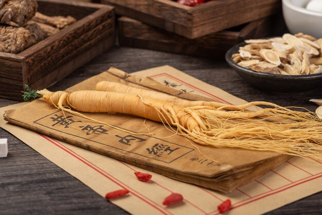 Premium Photo | Ginseng and traditional chinese medicine on the table