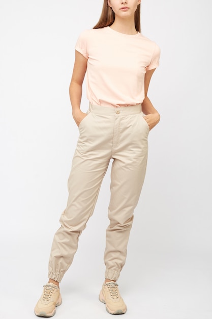 Premium Photo | Girl in beige cargo pants and a t-shirt