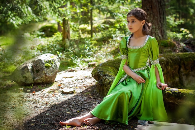 https://image.freepik.com/free-photo/girl-fairytale-elf-dress-sits-barefoot-runes-ancient-staircase_298446-732.jpg