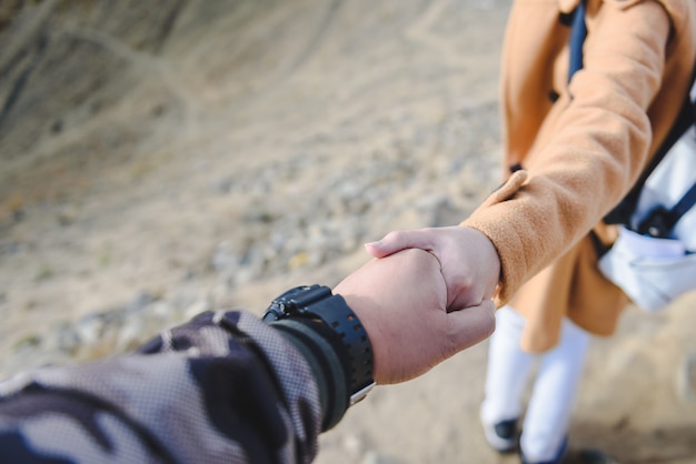 Premium Photo The Girl Hold The Boy Hand With Soft Light