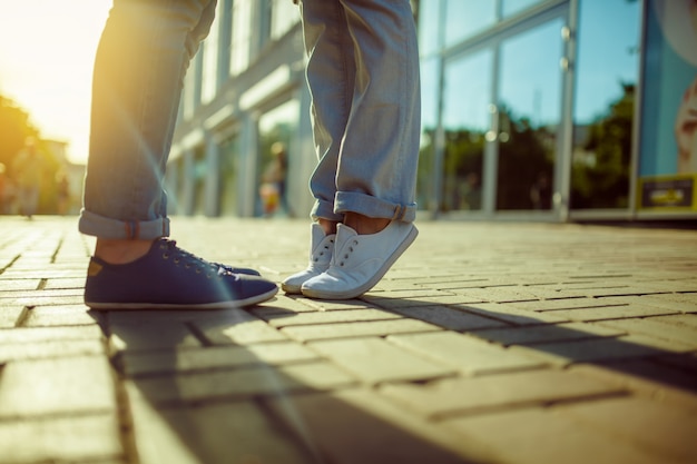 Premium Photo | Girl kisses guy. position of the feet